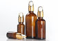 Fancy Amber Cosmetic Bottles Round Shape Customized Logo Printing