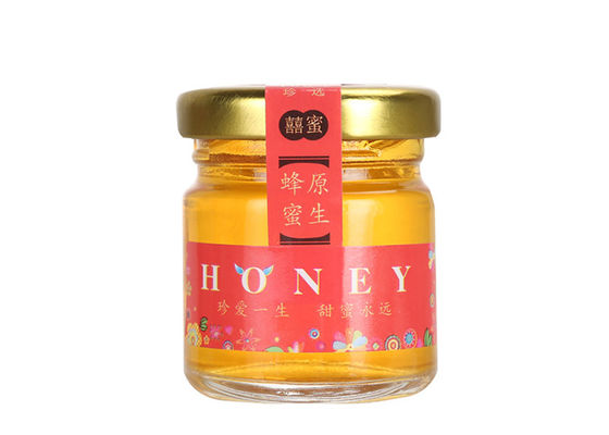 glass honey jars on